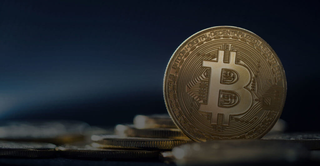 photo of a bitcoin with dark background